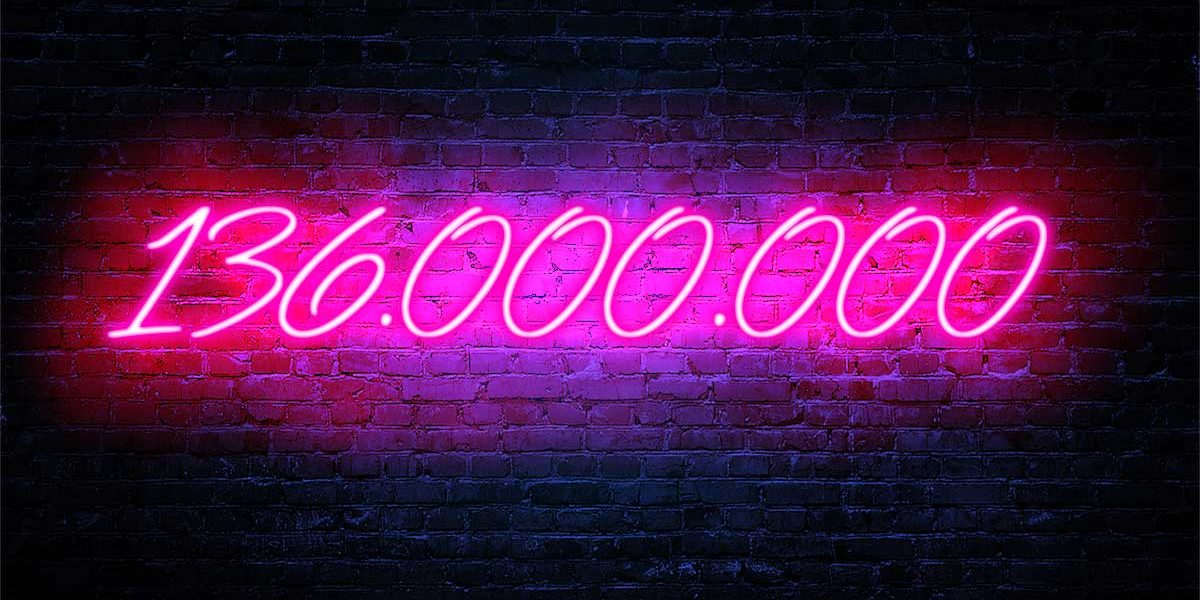 Umwandlung von Büroflächen Neonpinke Zahl auf schwarzen Hintergrund