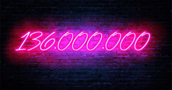 Umwandlung von Büroflächen Neonpinke Zahl auf schwarzen Hintergrund