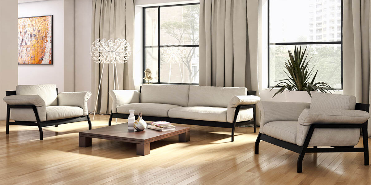 Ein Wohnzimmer mit hellgrauer Einrichtung - Was Homestaging bewirkt