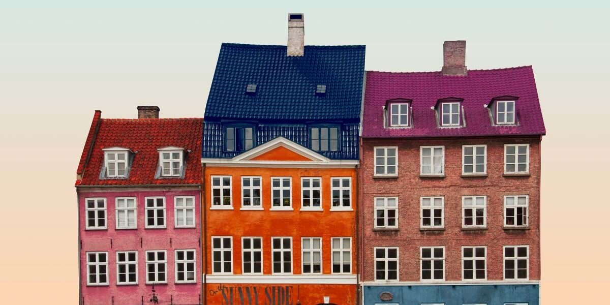 mieten oder kaufen, eine Häuserfassade mit verschiedenen Gebäuden